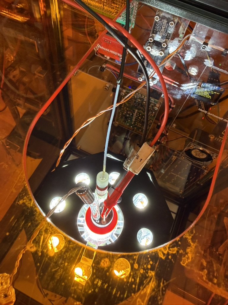 Illuminated electrochemical cell with electrodes and integrated sensors